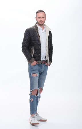 stylish young man looking at the camera. isolated on whiteの写真素材