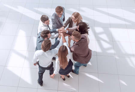 top view. corporate business team showing their unity