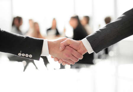 close up. business handshake on an office background. photo with copy-spaceの写真素材