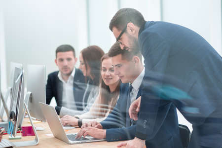 group of employees discussing new ideas together