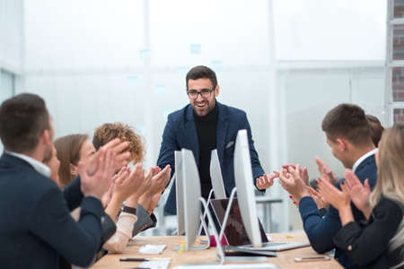 project Manager asks questions during an office meeting.の写真素材