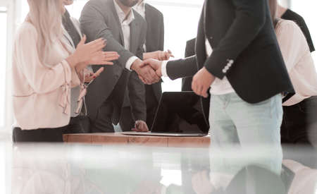 close up. happy business people greet each other with a handshake . the concept of cooperationの写真素材