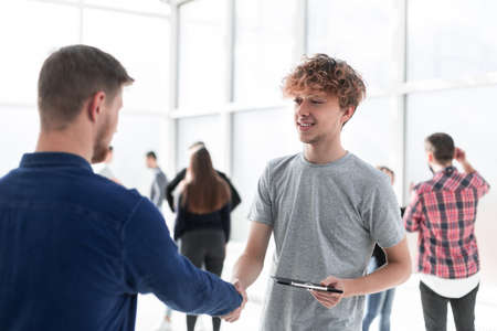 close up. young colleagues discussing business documentsの写真素材