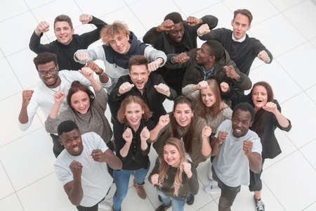team of diverse young people looking at the camera