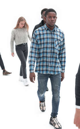 group of diverse young people striding forward.