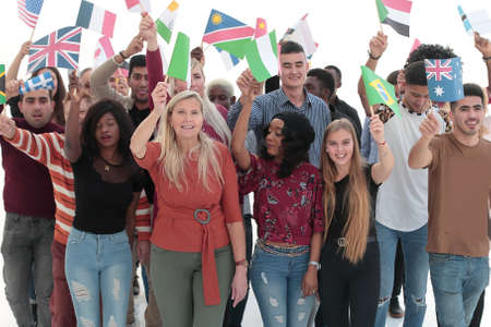 Group of people with flags isolated over white backgroundの写真素材
