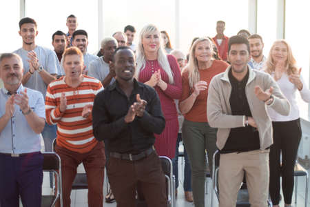 Audience Applauding Speaker After Conference Presentationの写真素材