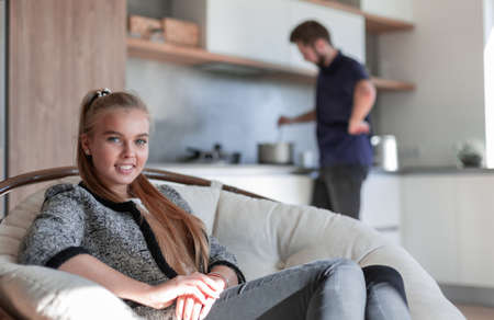 Happy couple cooking in kitchenの写真素材