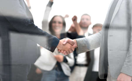close up. confident business handshake on an office background.の写真素材
