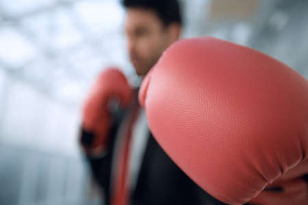 confident businessman in Boxing gloves.の写真素材