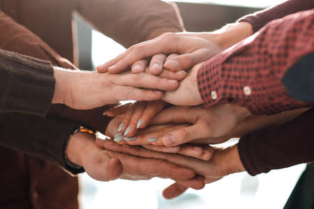 successful business team with hands clasped together.の写真素材