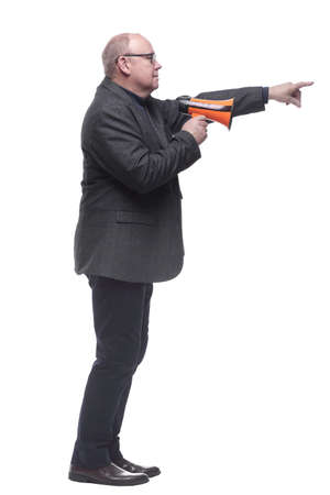 side view. a business man with a megaphone pointing aheadの写真素材