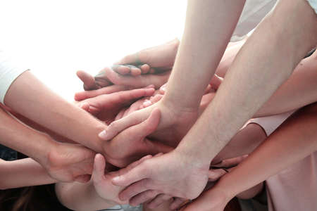 close up. diverse young people showing their unityの写真素材