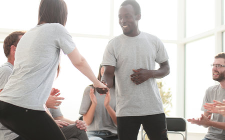 background image of friends greeting each other