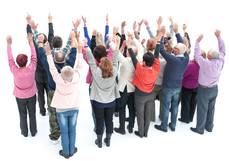 top view. group of diverse adults pointing at a white screen.の写真素材