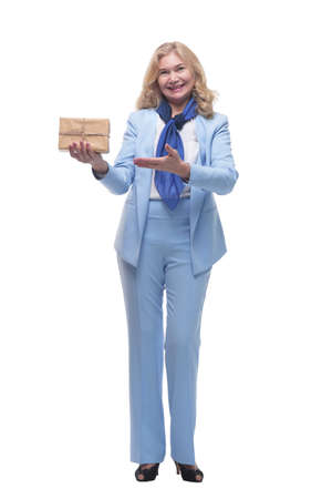 happy woman looking at a cardboard parcel box.の写真素材