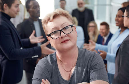 Woman business trainer and workers gather together in conferenceの写真素材