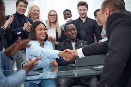 Handshake business people afher effective negotiation with clienの写真素材