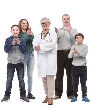 happy family and their family doctor standing together.