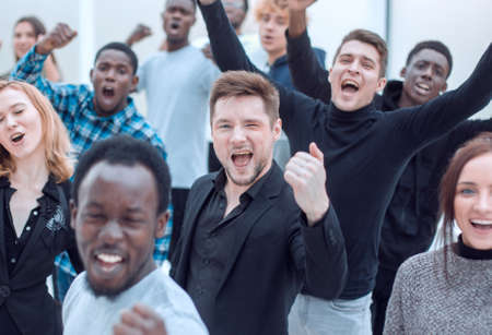 large group of jubilant diverse young peopleの写真素材