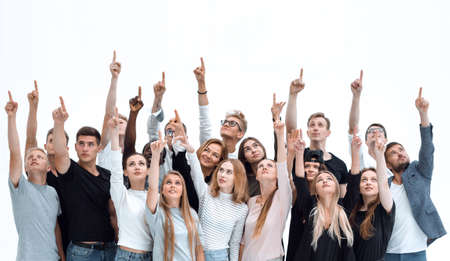 large group of young people pointing upの写真素材