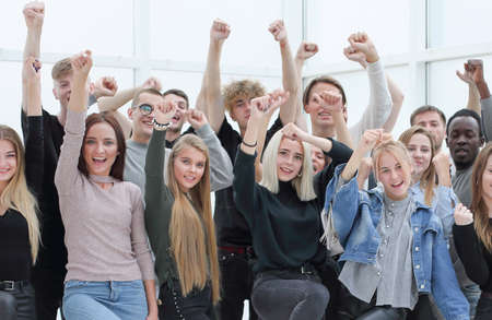 large group of successful young people showing their success.の写真素材
