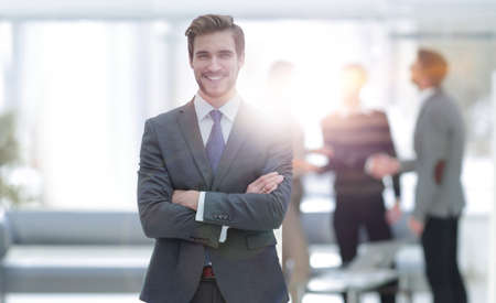 Successful businessman at the office leading a groupの写真素材