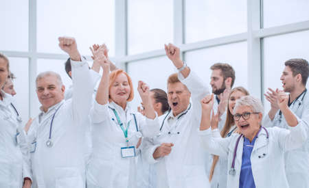 large group of diverse doctors celebrating together.の写真素材