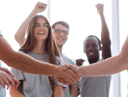handshake of members of the contact group, to applauseの写真素材