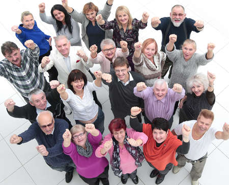 group of confident mature people showing their success