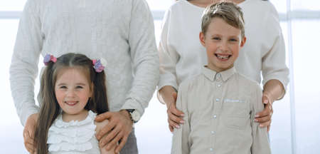 portrait of a happy family with small children