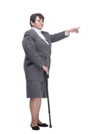 in full growth. confident old woman with a walking stick.の写真素材