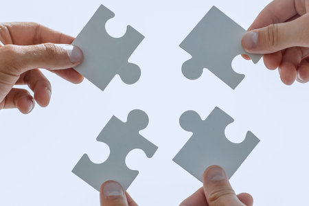 businessman people assembling jigsaw puzzle, team support and he