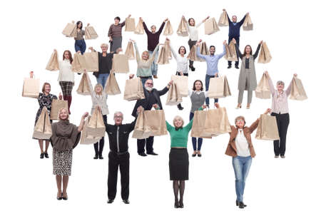 a group of people are running paper shopping bagsの写真素材
