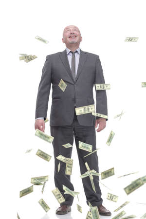 in full growth. smiling business man with dollar bills.の写真素材