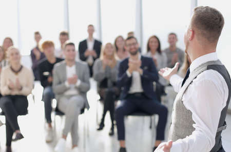 seminar participants supported the speaker with applause.