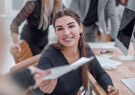 group of employees work on computers in the office.の写真素材