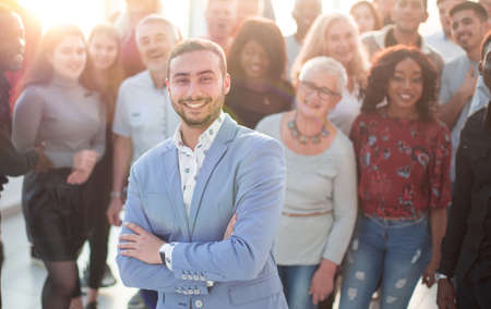 confident young man and his associates standing together.の写真素材