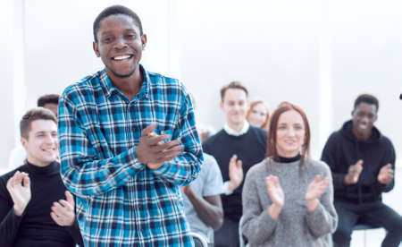 listener asks a question to a speaker at a business seminarの写真素材