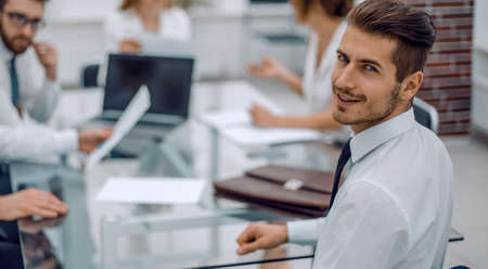 businessman and business team sitting at the Desk