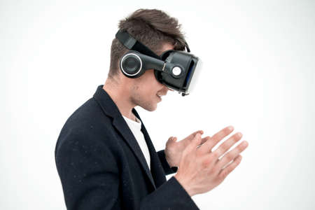 side view.modern businessman in a virtual reality helmet.
