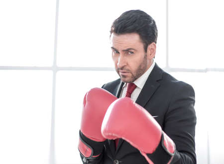 close up. businessman showing hand in Boxing glovesの写真素材