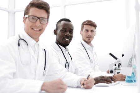laboratory staff sitting at the Desk