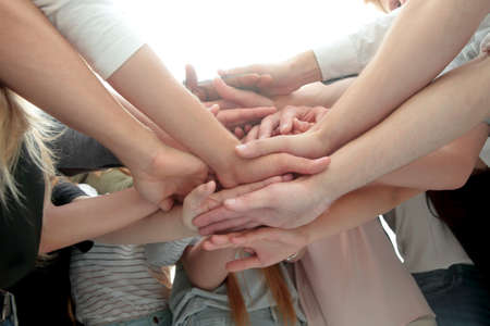 close up. diverse young people showing their unity