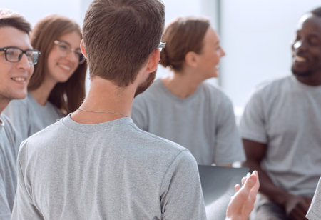 close up. group of young people sitting in a circle