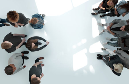 top view . young people moving in opposite directionsの写真素材