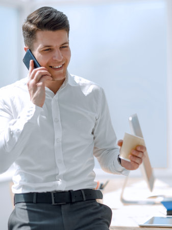 businessman talking on the phone during a work breakの写真素材