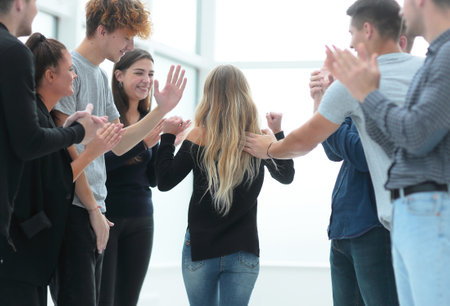 happy business team giving each other a high five.