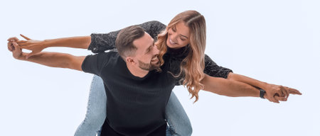 in full growth. happy young couple having fun