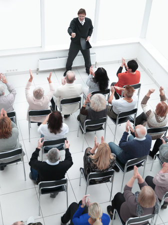 audience asks a question to the speaker during the seminarの写真素材